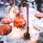 Night time light red Maren wines on outside table
